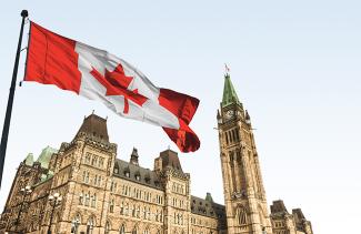 Canadian parliament with Canadian flag