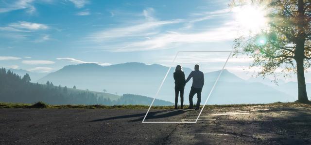 silhouette of couple on mountain 