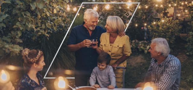 family eating together in back garden